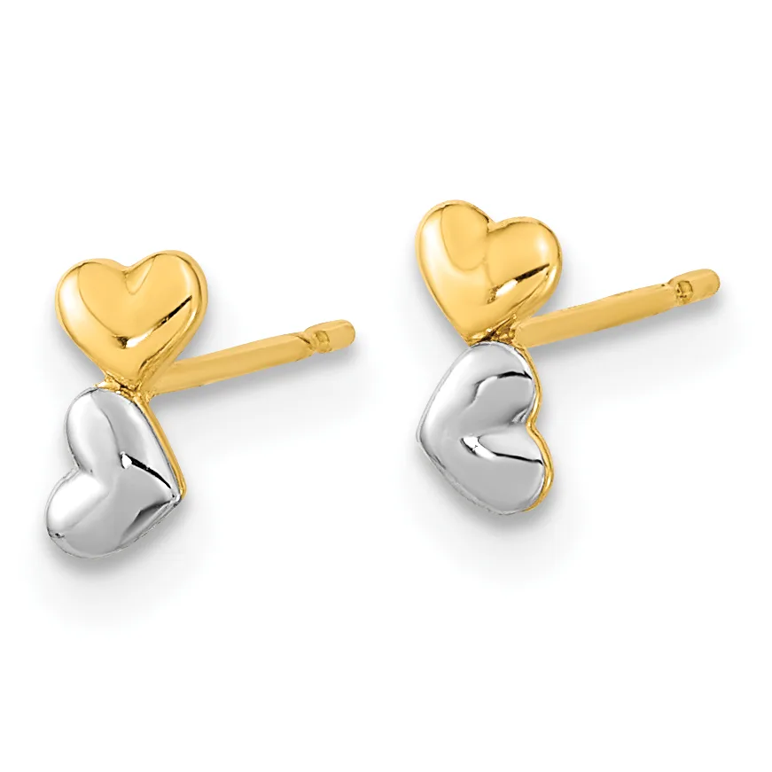 A pair of two-tone heart stud earrings featuring polished gold upper hearts and silver lower hearts on gold posts.