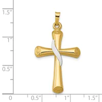 A two-tone gold cross pendant with a polished gold vertical beam and horizontal bar, accented with white gold or silver wrapping, displayed next to a measurement scale.