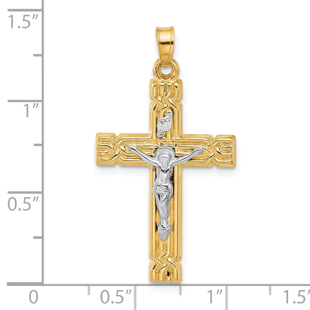 Two-tone gold crucifix pendant with textured borders and a silver-colored corpus, shown next to a measurement scale indicating approximately 1.25 inches in height.