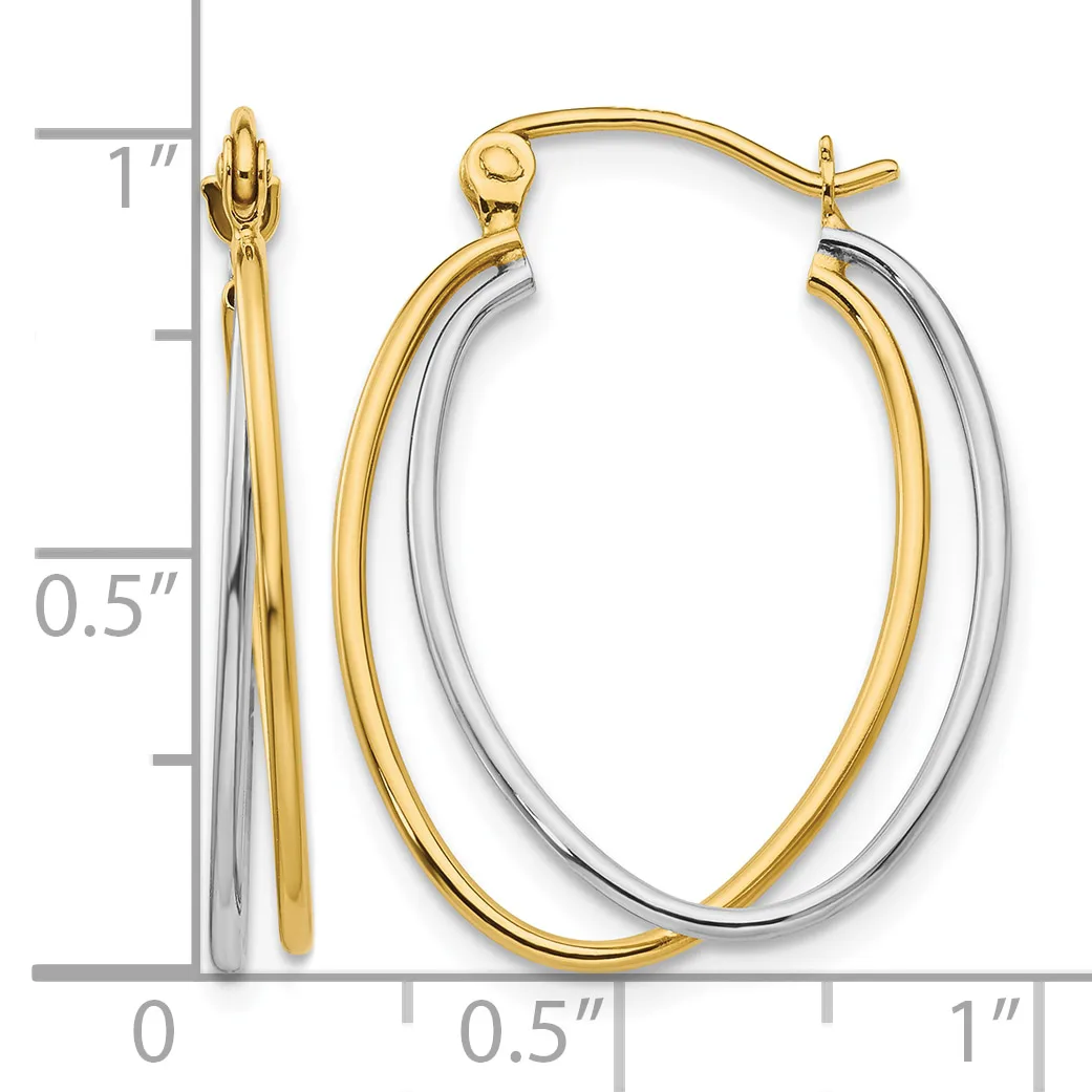 Two-tone oval hoop earrings in yellow and white gold with posts and backs, displayed against a measurement scale showing approximately one inch in length.