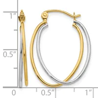 Two-tone oval hoop earrings in yellow and white gold with posts and backs, displayed against a measurement scale showing approximately one inch in length.