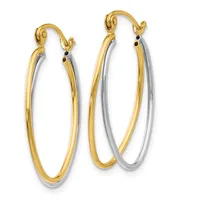 A pair of two-tone hoop earrings with gold outer bands and silver inner bands, featuring gold hook closures with small black accent details.