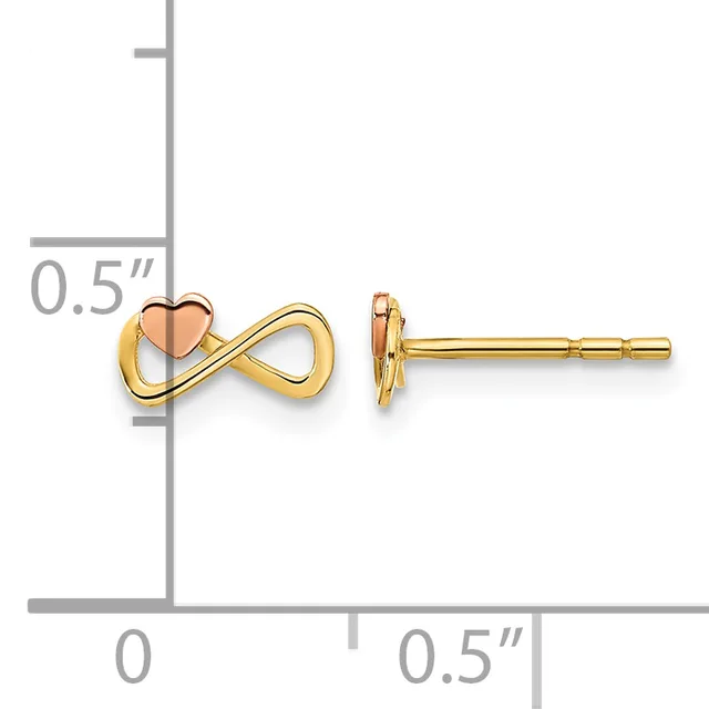Gold stud earrings featuring an infinity symbol with a small rose gold heart, displayed on a measurement scale showing approximately 0.5 inches in length.