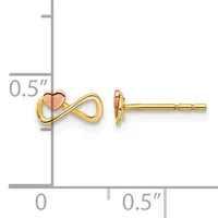 Gold stud earrings featuring an infinity symbol with a small rose gold heart, displayed on a measurement scale showing approximately 0.5 inches in length.