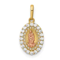 Gold pendant featuring a oval frame set with round diamonds surrounding a central figure of Mary in rose gold, with a radiating sunburst design behind her.