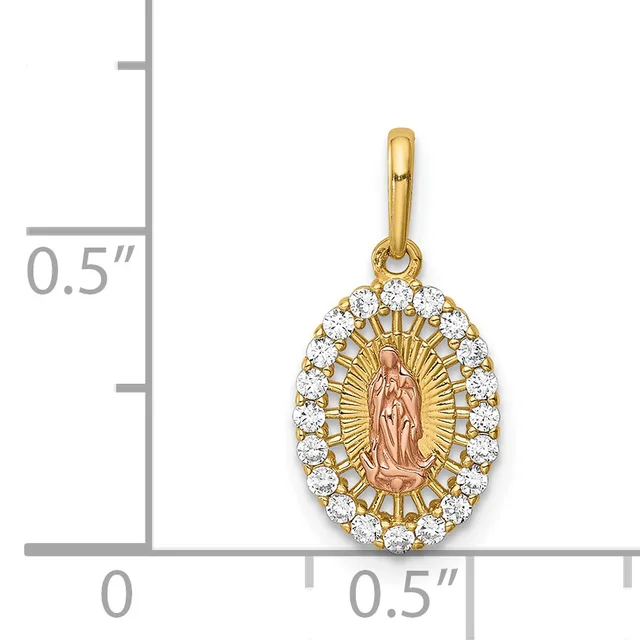 Two-tone gold oval pendant with a center relief figure surrounded by a halo of round white stones, shown next to a measurement scale.