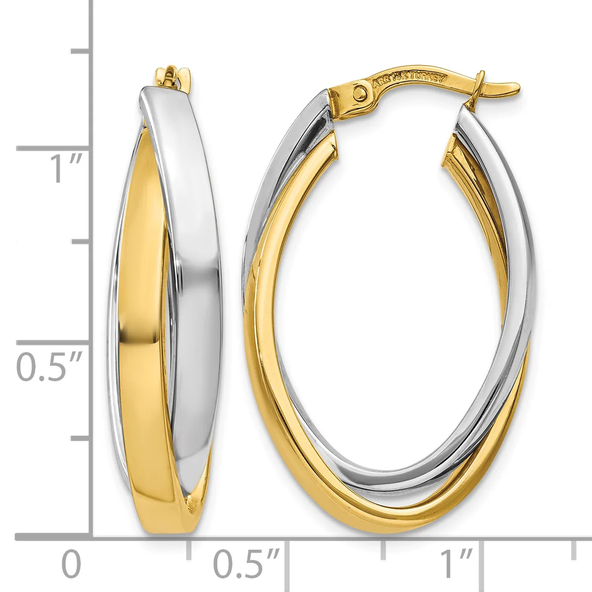 Two-tone oval hoop earrings with white and yellow gold alternating segments, shown with a measurement scale indicating approximately one inch in height.