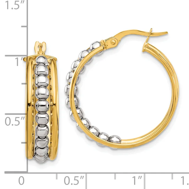Two-tone gold hoop earrings with textured beaded detailing on the inner surface, displayed with a measurement scale showing approximately one inch in diameter.