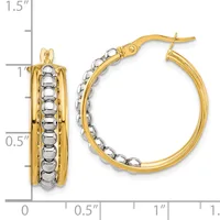 Two-tone gold hoop earrings with textured beaded detailing on the inner surface, displayed with a measurement scale showing approximately one inch in diameter.