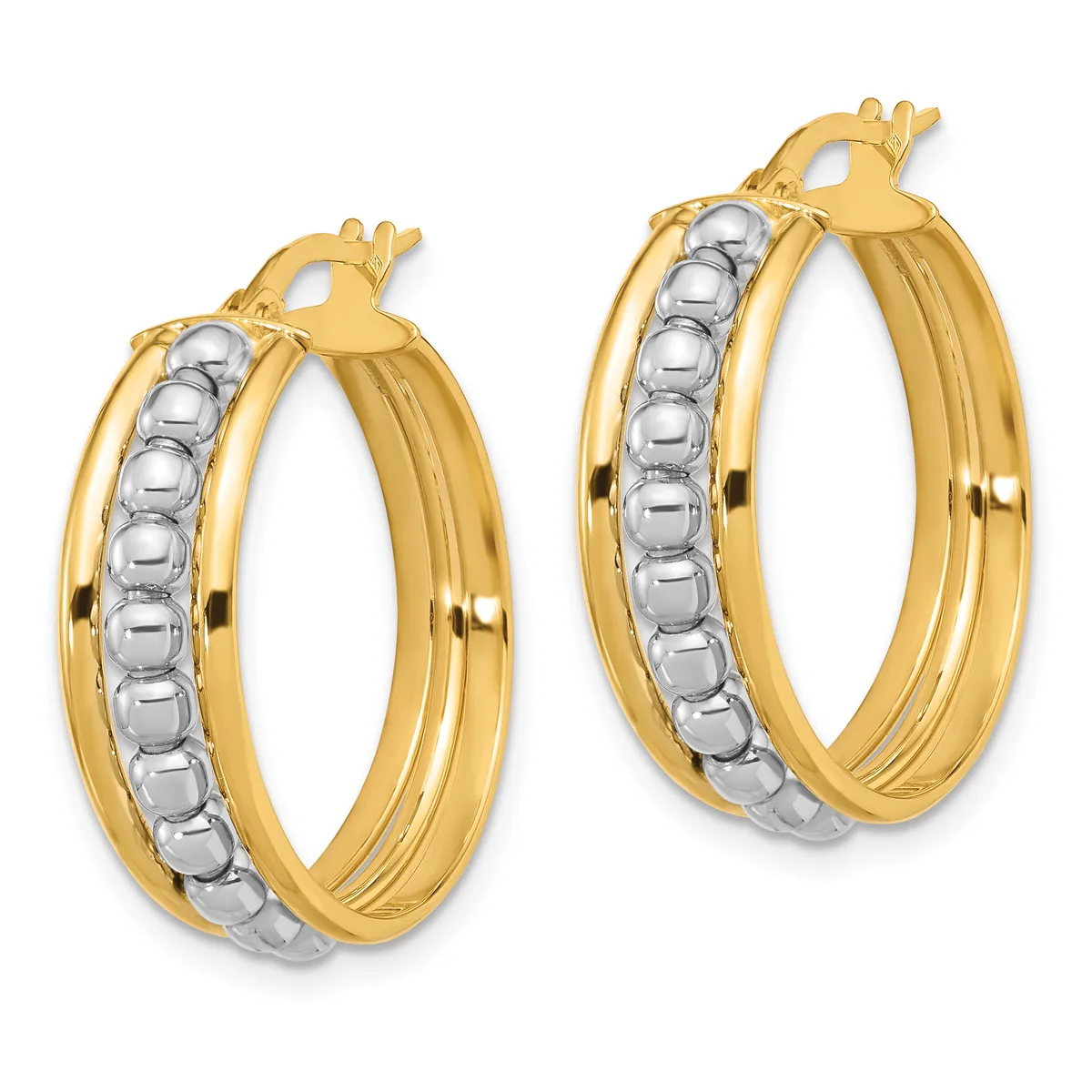 A pair of two-tone gold hoop earrings with textured white metal beaded inlay down the center and ridged gold outer bands, shown from the front.