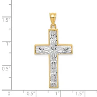 A two-tone cross pendant with textured silver center and polished gold outline, shown against a measurement scale indicating approximately 1.25 inches in height.