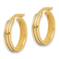 Pair of gold hoop earrings with two-tone textured and polished bands, featuring hinged posts and backs.