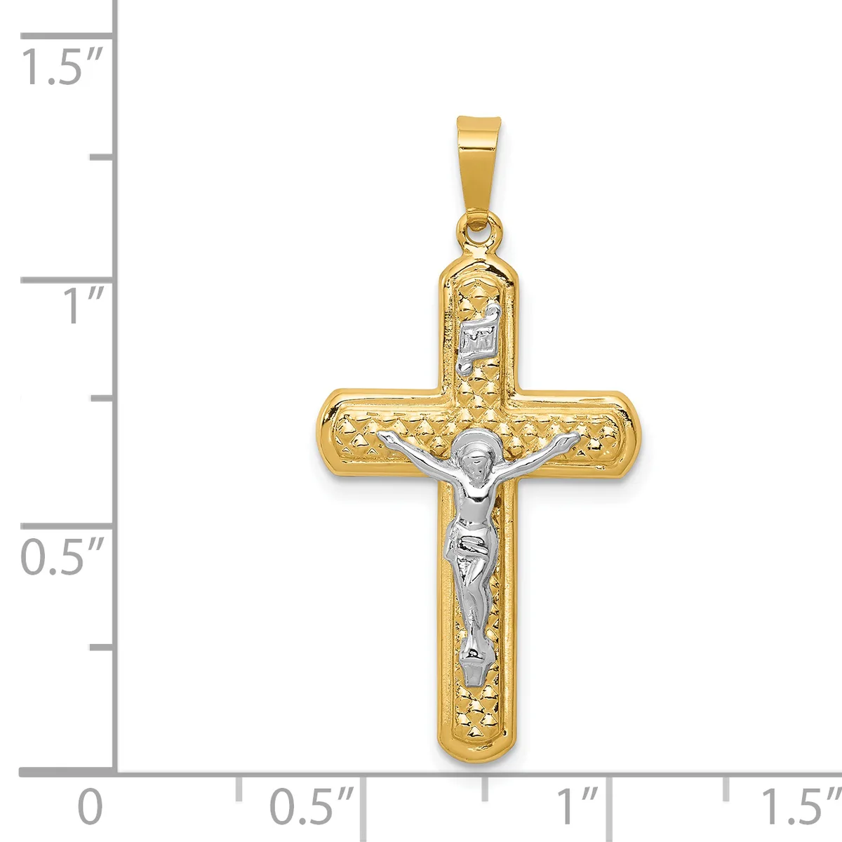 Two-tone gold crucifix pendant with textured gold cross and white gold corpus figure, shown next to a ruler measuring approximately 1.25 inches tall.