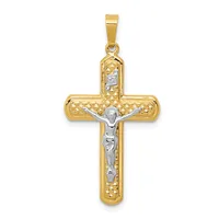 Two-tone gold crucifix pendant with textured yellow gold cross and white gold corpus figure, suspended from a bail loop.