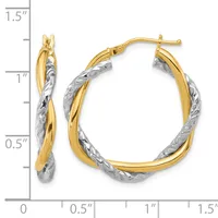 Two-tone twisted hoop earrings with yellow gold outer tubes and white textured inner tubes, approximately 1.25 inches in diameter, shown with a measurement scale.