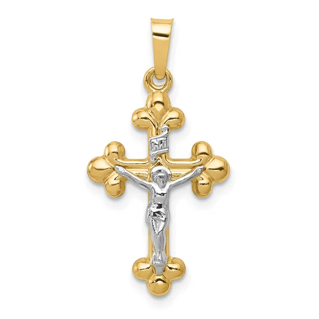 A two-tone gold crucifix pendant with a white gold corpus and gold fleur-de-lis terminals at each arm and base, suspended from a rectangular bail.