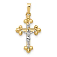 A two-tone gold crucifix pendant with a white gold corpus and gold fleur-de-lis terminals at each arm and base, suspended from a rectangular bail.