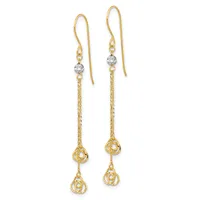A pair of gold-toned dangle earrings with fish hook wires, featuring small round crystal beads at the top, delicate chain strands, and decorative twisted knot charms at the bottom.