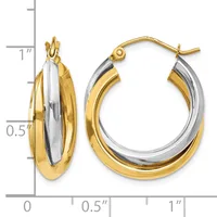 Two-tone gold and silver hoop earrings with a polished finish, shown next to a ruler indicating approximately one inch in diameter.