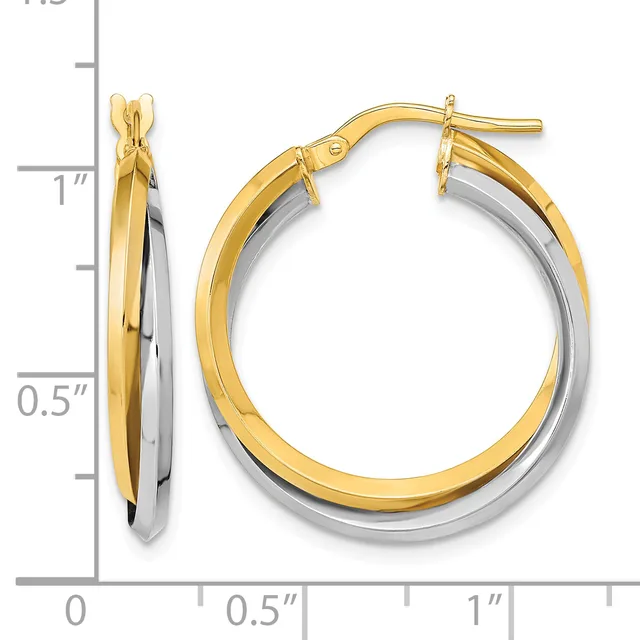 Two-tone gold and silver hoop earrings with a twisted design, displayed next to a measurement scale showing approximately one inch in diameter.
