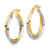 A pair of two-tone hoop earrings with yellow and white gold twisted design and clip-back closures, displayed against a white background.