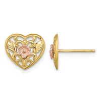Pair of gold heart-shaped stud earrings with ornate filigree design and a small rose-gold flower accent in the center, shown from front and side views.
