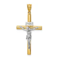 Two-tone gold and silver crucifix pendant with a hollow tubular gold cross and a detailed silver corpus, suspended from a gold bail.
