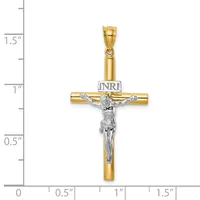 Two-tone gold crucifix pendant with silver-colored corpus and INRI plaque, displayed against a measurement scale showing approximately 1.25 inches in height.