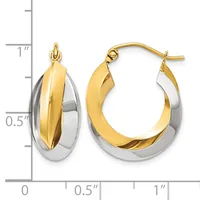 Two-tone gold and silver hoop earrings with a twisted design, shown next to a measurement scale indicating approximately one inch in length.