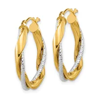 Pair of two-tone gold twisted hoop earrings with yellow gold outer surfaces and white gold textured inner sections, shown against a white background.