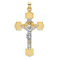 A two-tone gold and silver crucifix pendant with a polished silver corpus figure and four gold rectangular shield-shaped terminals, displayed against a white background.