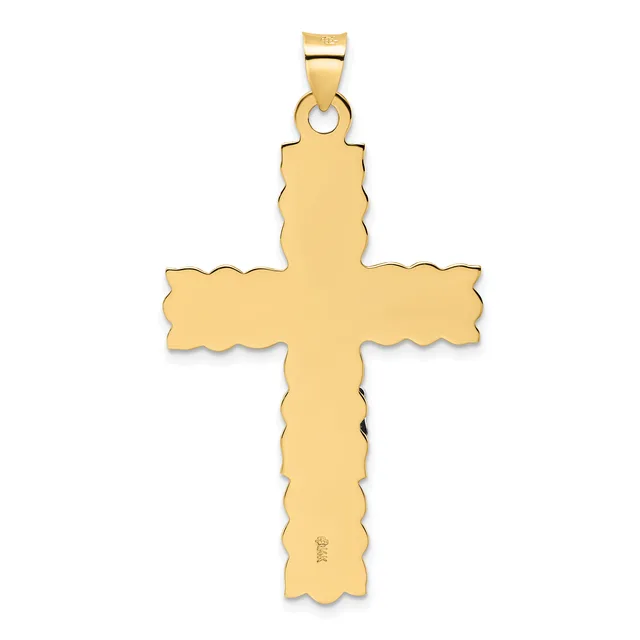 A gold cross pendant with scalloped edges and a small hallmark stamp on the lower arm, suspended from a gold bail.