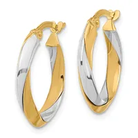 A pair of two-tone gold hoop earrings with twisted white and yellow gold bands, featuring hinged closures with small decorative caps.