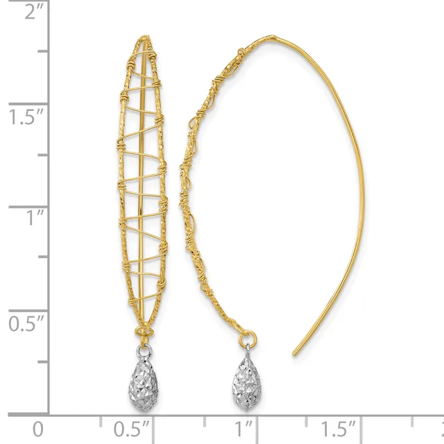 Pair of gold threader earrings with textured oval designs and dangling teardrop-shaped white crystal pendants, displayed against a ruler showing approximately two inches in length.