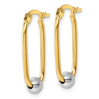 Pair of gold hoop earrings with silver-toned ball accents at the bottom, shown against a white background.