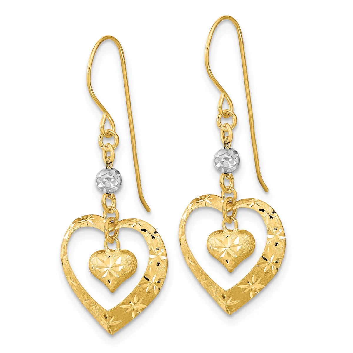 A pair of gold heart-shaped dangle earrings with textured outer hearts containing smaller smooth hearts inside, connected by small silver beads and gold hooks.