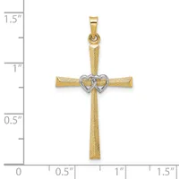 Two-tone gold cross pendant with textured gold arms and a small heart design at the center, shown against a measurement scale indicating approximately 1.5 inches in height.