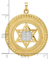 Gold Star of David pendant with Hebrew text on silver tablets in the center, surrounded by an ornate circular border, shown next to a ruler for scale.