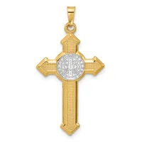 A gold cross pendant with textured surface and a silver circular medallion at the center featuring religious iconography.