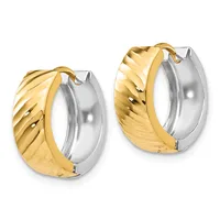 A pair of two-tone hoop earrings with twisted yellow gold fronts and polished silver backs, displayed side by side.