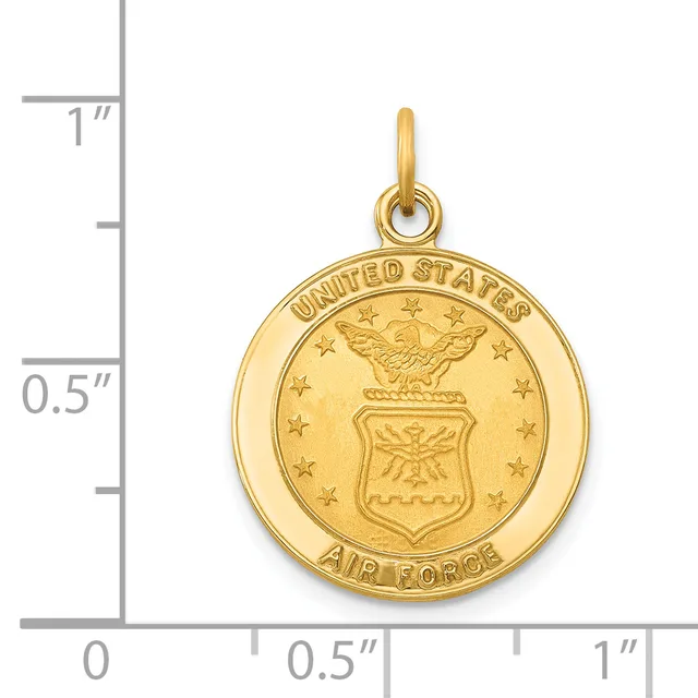 Gold-colored circular pendant featuring a United States Air Force seal with an eagle and shield, shown next to a measurement scale indicating approximately one inch in diameter.