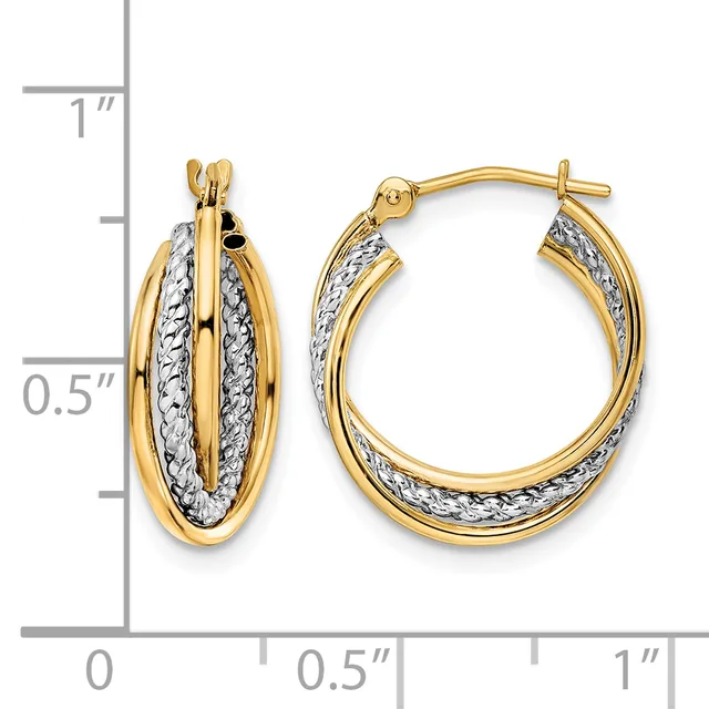 Two-tone gold hoop earrings with textured white gold centers and polished yellow gold outer bands, shown next to a ruler indicating approximately one inch in length.