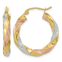 Pair of tricolor gold hoop earrings with twisted design featuring yellow, white, and rose gold sections, shown from front and side views.