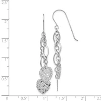 A pair of silver dangle earrings with chain links and textured spherical pendants, shown against a ruler measuring approximately 2.5 inches in length.