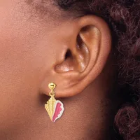 A person wearing a gold-toned shell-shaped earring with pink enamel accents on the earlobe, shown in profile view.