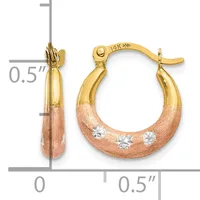 Two-tone gold hoop earrings with textured rose gold bottoms and diamond accents, shown with a measurement scale indicating approximately 0.5 inches in diameter.
