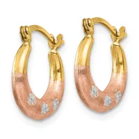 A pair of two-tone gold hoop earrings with yellow gold upper sections and rose gold lower sections featuring a frosted finish and small white diamond accents.