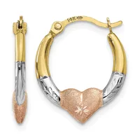 Pair of three-tone gold hoop earrings with a heart charm, shown from front and side views with a small stamped hallmark visible on the upper curve.
