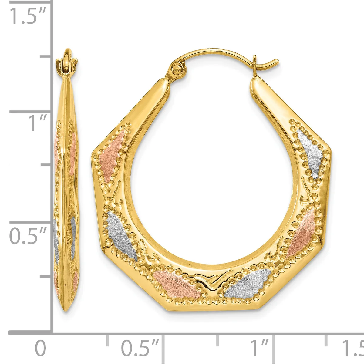 Gold hoop earrings with textured surface and multicolored inlay featuring pink and silver tones, displayed against a measurement scale.