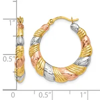Tri-color gold hoop earrings with textured sections in yellow, white, and rose gold, displayed next to a ruler showing approximately one inch in length.
